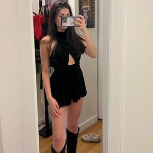 Black high neck romper with slit in the middle. Perfect condition no flaws